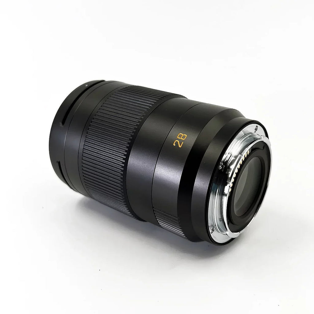 Leica -Summicron- 28mm f/2 Aspherical Lens + Padded Medium Sized Case + 67mm 3-Piece Filter Kit + Lens Cap Keeper + 6Ave Cleaning Kit